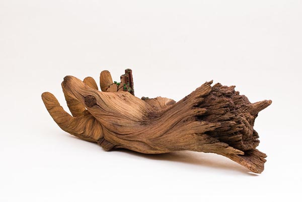 Cycle of Decay - ceramic hand sculpture looks like a tree branch