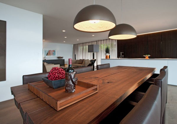 Dining Table inside the Concrete Block House by SimmenGroup
