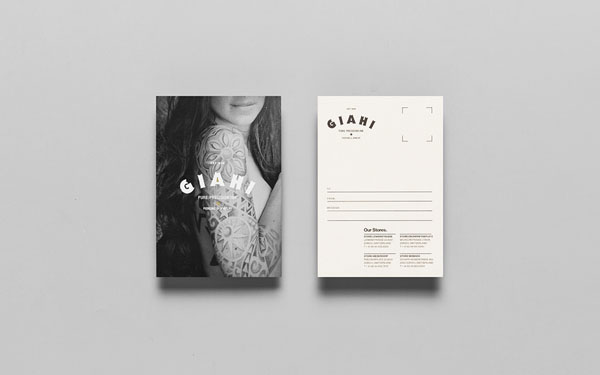 Giahi tattoo and piercing studio - business card design by Anagrama