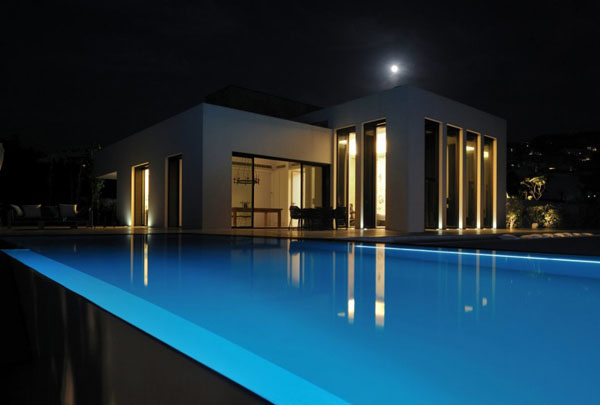 Pool and Beach House at Night