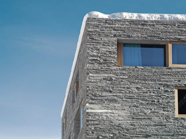 Rough Facade - Rocksresort in Laax, Switzerland by Domenig Architekten