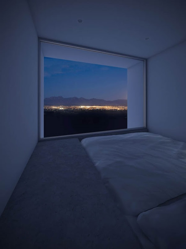 Bedroom of the Four Eyes House in Coachella Valley, California by Edward Ogosta Architecture