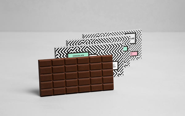 Xoclad Chocolate Brand Identity by Anagrama