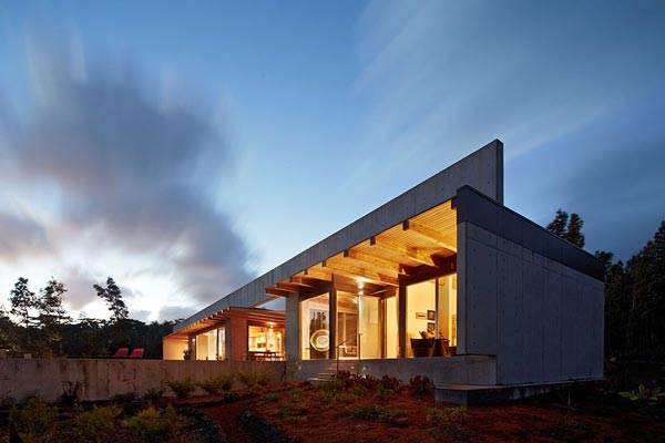 The cast-in-place concrete house in Hawaii at sunset