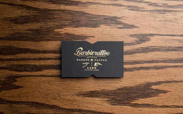 Barbierattoo business card from a barbershop identity design by studio Memela.