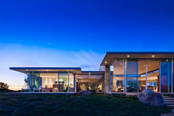 The modern architecture of the beautiful house at dawn - a residence in California designed by Neumann Mendro Andrulaitis Architects.