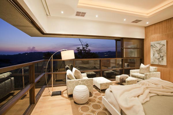 Also this luxurious bedroom provides a breathtaking view of the landscape.
