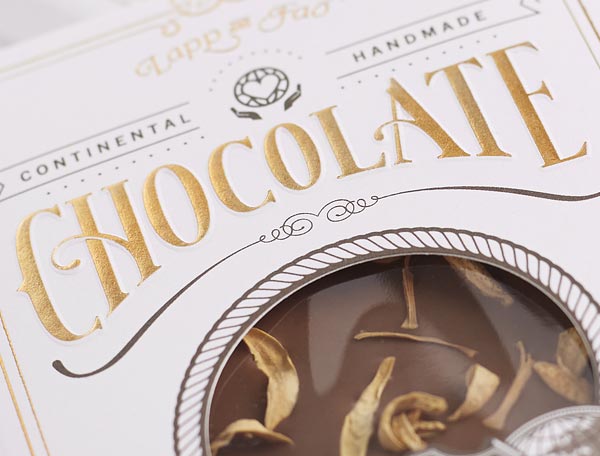 Clouse up of a classic chocolate packaging designed by Studio Chapeaux for gourmet chocolate postcards by Lapp & Fao.
