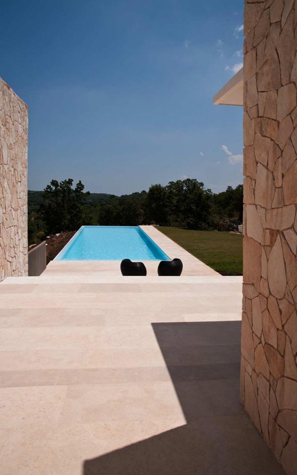 View from the house towards the terrace and the swimming pool.