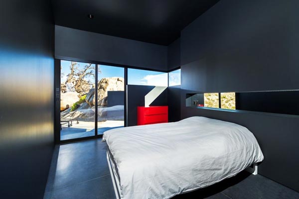 The master bedroom is characterized by modern and clean interior design.
