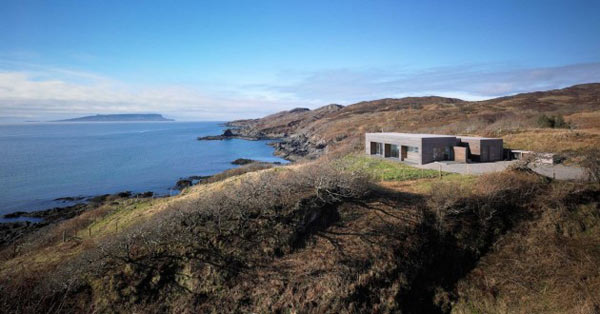 The modern designed house is situated amidst the natural environment of the Isle of Skye.