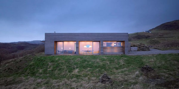 Contemporary architectural design amidst the rough Scottish nature.