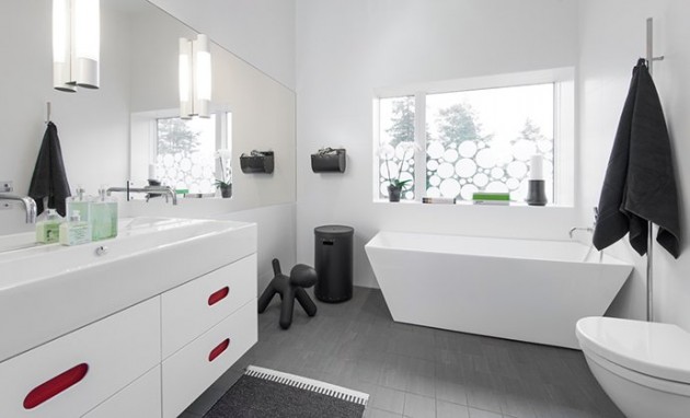 The bathroom impresses with modern interior design.