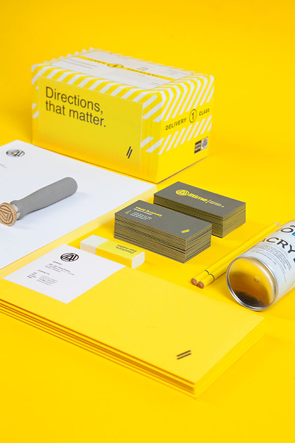 Corporate identity design based on yellow, grey and white colors.