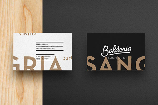 Two-sided business cards in black and white.