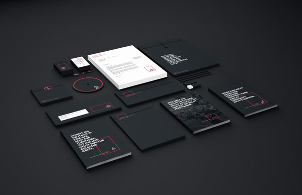 Stationery and communication materials - black and white in combination with a striking red color.