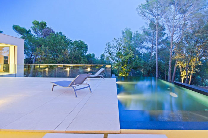 Patio with infinity pool.