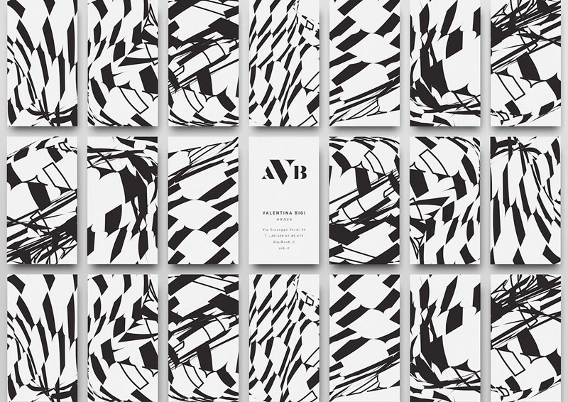 Business cards with abstract patterns on the back.