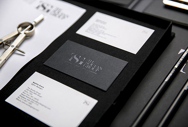 Close up of the black and white business cards.