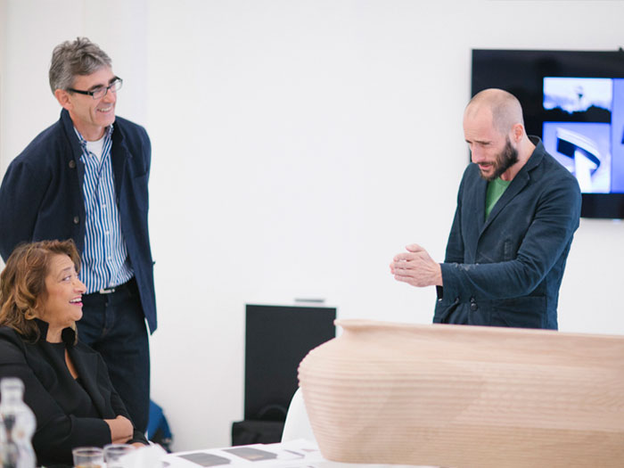 Designer Gareth Neal in talk with architect Zaha Hadid.