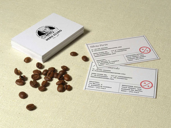 Business cards and coffee beans.