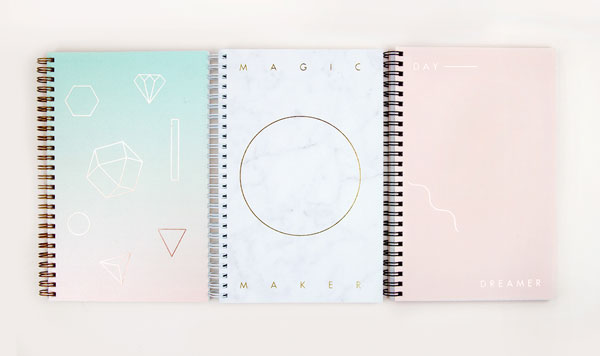 Notebooks with simple ornaments on the cover.