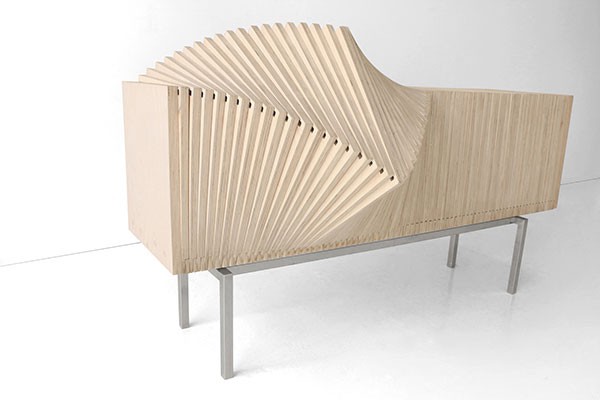 The Wave Cabinet is made of natural wood.