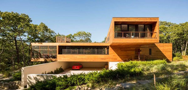 Front of the Hamptons home In the woods by Rangr Studio.