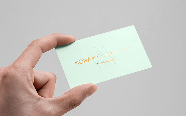 Business card with logo embossing.