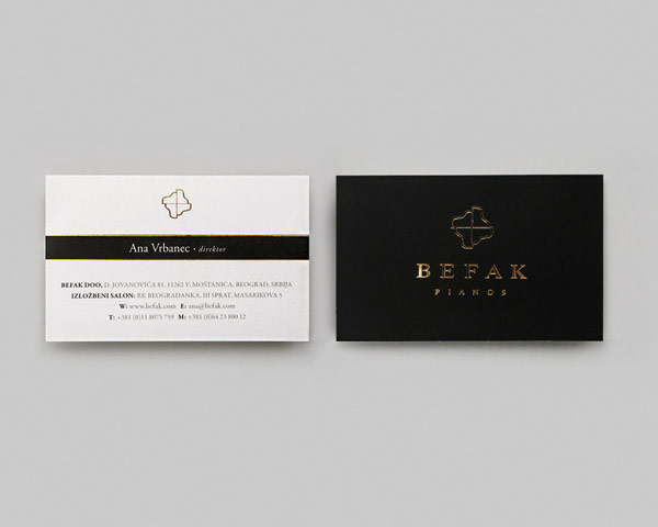 Front and back of the business card.