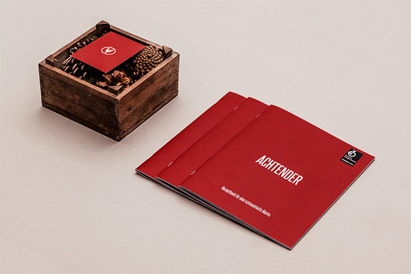 The color red was used as striking corporate color for all branding materials.