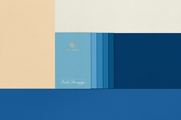 Business cards with different shades of blue.