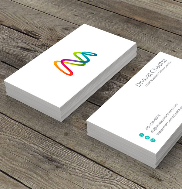 Two-sided business cards with the colorful logo design on the front and the contact information on the back.