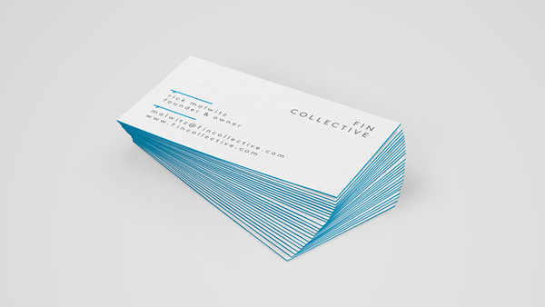 Simple two tone business cards on white thick paper with blue edges.