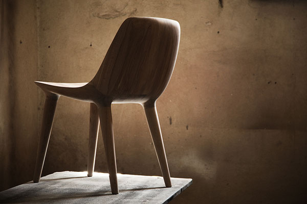 The backside of the chair shows harmonious and flowing forms.