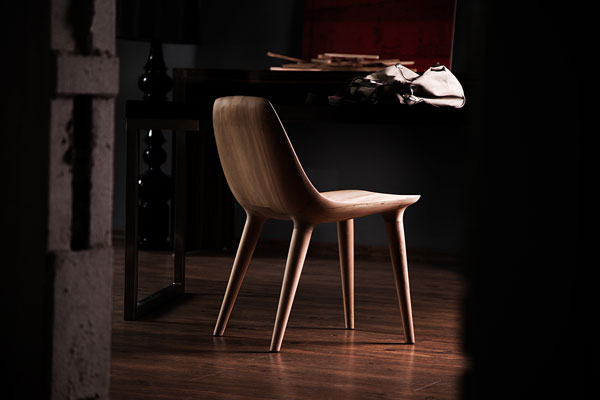 The DARYA chair was designed and hand carved by Ali Alavi, an Iranian furniture designer.