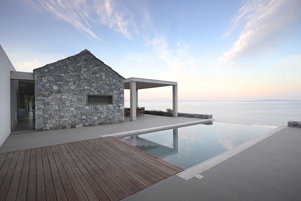 Villa Melana, a modern country house in local arcadian stone with great sea views.