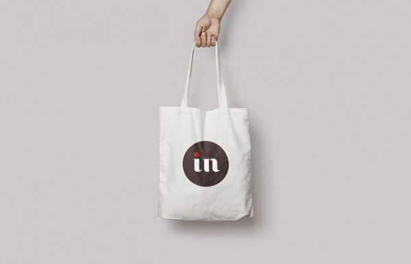 The cloth bag is part of a set of promotional items.