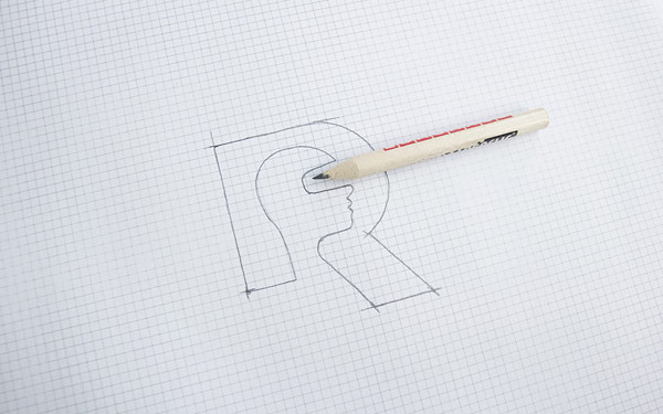 A pencil sketch of the logo.