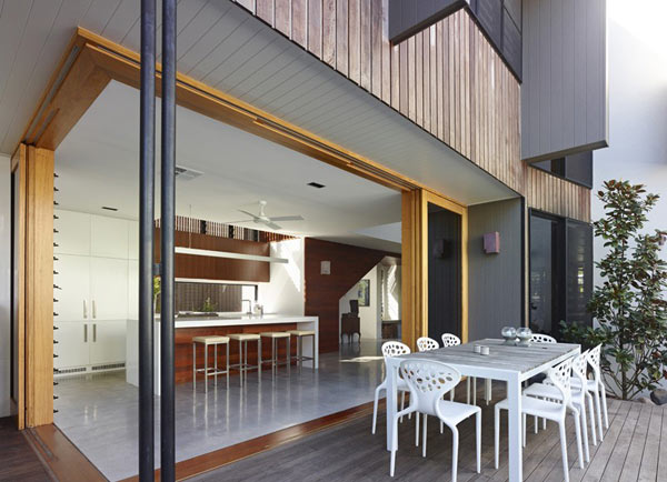 The kitchen space offers an open connection to the terrace.