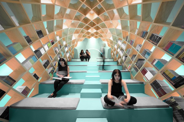 Conarte Library – the council for culture and art in the city of Monterrey, Mexico –  Anagrama's interior design proposal creates a space that wraps the reader in.