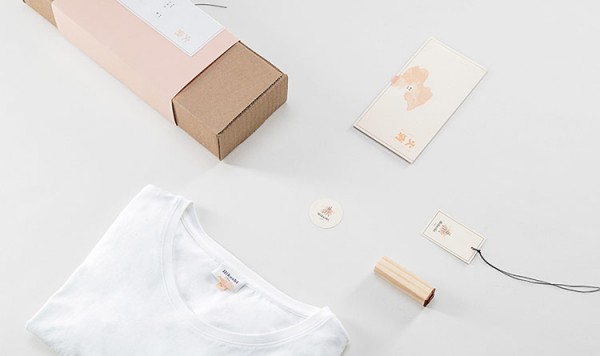 Packaging and some branding materials of the minimalist fashion identity developed by studio Futura for Japanese fashion line, Hikeshi.