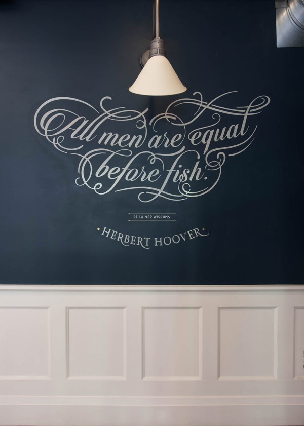 A lettering with a quote on an inner wall of the store.