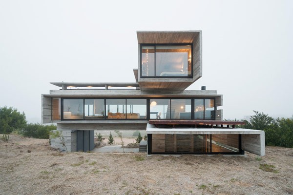 Front view of the Argentinian concrete house by Architect Luciano Kruk.