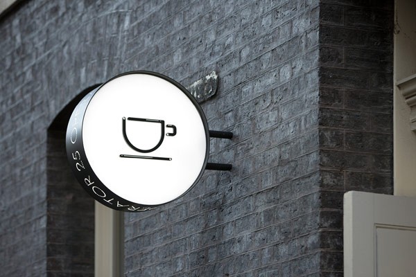 The other side of the signage with custom coffee pot icon.