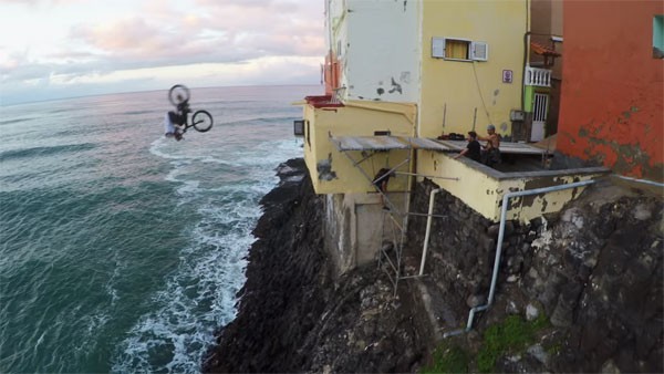 A big jum by Danny MacAskill with front flip into the ocean.