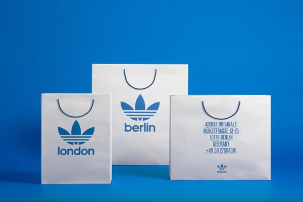 A collection of Adidas store bags.