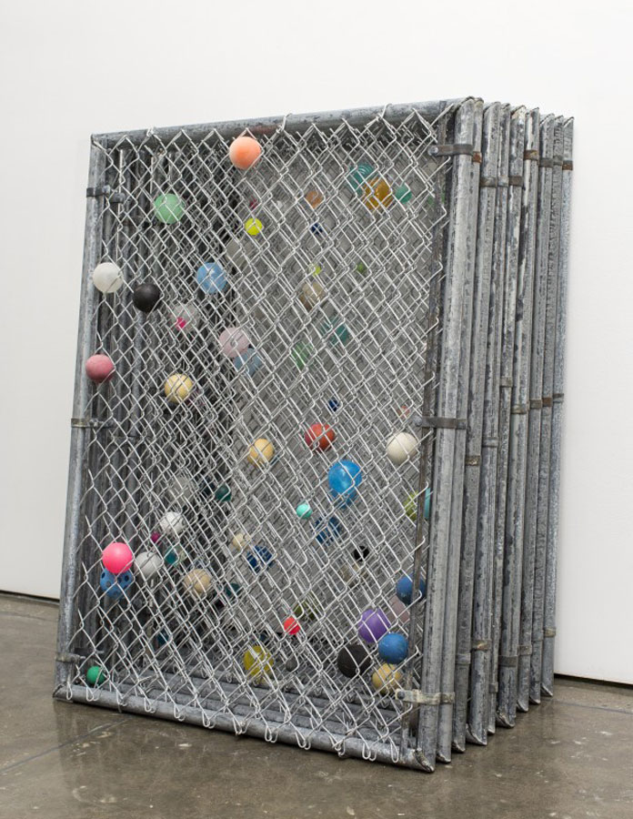 Installation from 2015 with balls in chain link frames.