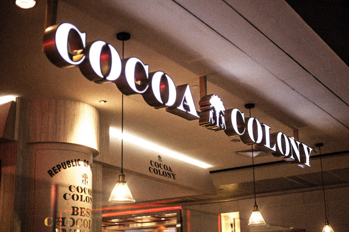 The Cocoa Colony signage at the entrance of the shop.