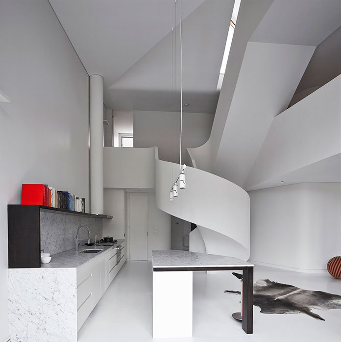 A loft apartment by AAArchitects in West Melbourne VIC, Australia.